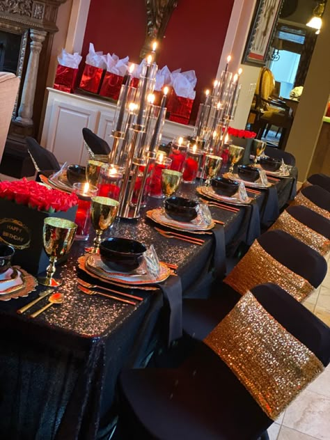 Black,gold and red dinner oartt table decor Black Red And Gold Birthday Party, Black And Gold Dinner Party Decor, Red Black White And Gold Birthday Party, Red Black And Gold Table Decorations, Black Red And Gold Table Decor, Black Gold Red Party Decor, Elegant Red Black And Gold Party Decorations, Red Black And Gold Party Ideas, Gold Red Black Party