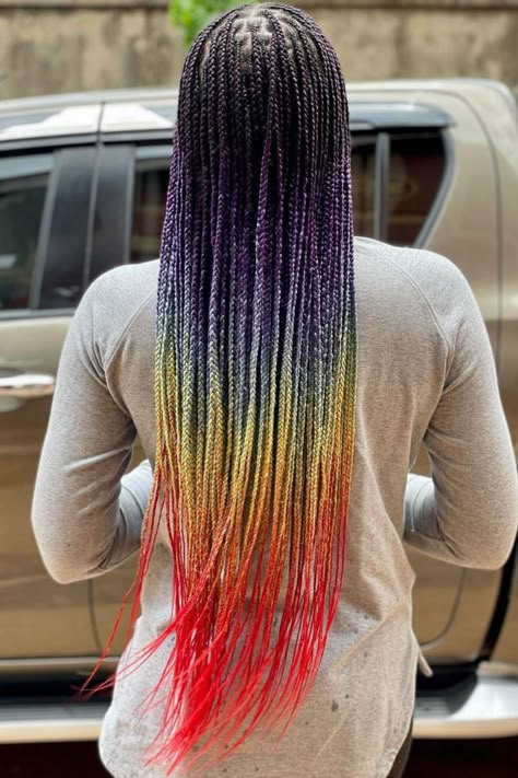 Pride Box Braids, Rainbow Box Braids Ombre, Rainbow Braided Hairstyles, Peekaboo Rainbow Box Braids, Colorful Hair Braids, Rainbow Cornrows, Rainbow Peekaboo Braids, Rainbow Braids For Black Women, Colorful Braids For Kids