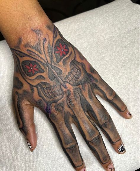 Butterfly Hand Tattoo For Women Black, Hand Tatts Skeleton, Skelton Hand Tattoo Girl, Female Skull Hand Tattoo, Butterfly Skeleton Hand Tattoo, Skelton And Hand Tattoo, Butterfly Skull Hand Tattoo, Thug Tattoos For Women Hand, Butterfly Hand Tattoo Men