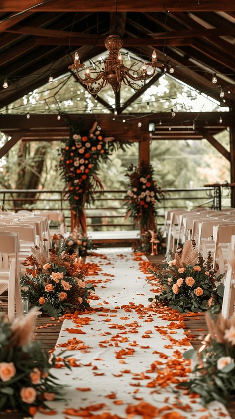 Planning a wedding is exciting but can also be a bit overwhelming. But if you're considering a fall wedding, you're in for a treat. There are many ways you can go about a fall wedding Fall Leaves Wedding Aisle, Outdoor Wedding Autumn, Weddings In Fall, Aisle Decorations Wedding Fall, Cozy Wedding Ceremony, Red Orange And White Wedding, Fall Venues Wedding Ideas, Wedding Arch Orange, Wedding Ideas Fall Rustic