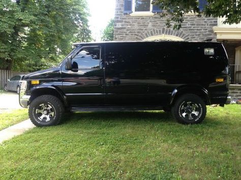 Up for sale is this custom, black 1993 Ford E 250 cargo van with a Quigley lift kit installed and VERY LOW MILEAGE. Description from 2040-cars.com. I searched for this on bing.com/images 4x4 Van For Sale, Ford Custom Van, Custom Vans For Sale, Ford Van Conversion, Lifted Van, Cargo Vans, Chevy Van, Build A Camper Van, Build A Camper