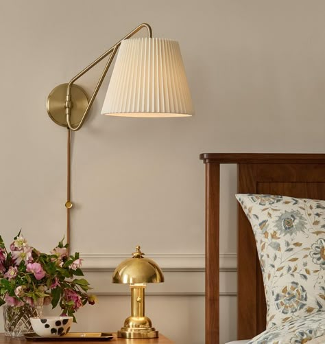 Inspired By French Lighting Designs, Eden Features A Slender Swing-Arm Paired With A Classic Smooth Or Pleated Linen Shade. Bedside Scones, Bed With Sconces, Light Sconces Bedroom, Bedroom Sconces Bedside, Brass Lampshade, French Lighting, Plug In Wall Lights, Interior Design Resources, Sconces Bedroom