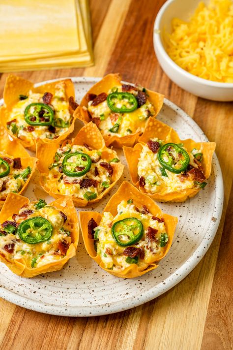 Easy Jalapeno Popper Wonton Cups (Video) - One Happy Bite Asian Wonton Cups Appetizers, Wonton Jalapeno Cups, Wonton Appetizers For Party, Cheesy Sausage Wonton Cups, Wonton Wrapper Cups, Jalapeno Poppers Wonton Cups, Jalapeño Wonton Cups, Appetizer Recipes Wonton Cups, Wanton Cup Appetizers