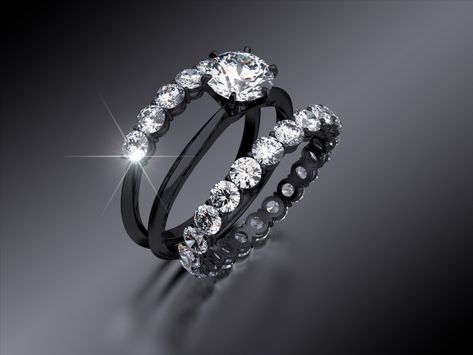 How Are Black Gold Engagement Rings Made? Black Band Wedding Rings, Black Band Wedding Rings For Her, Black Engagement Ring Silver, Black Wedding Ring For Women, Black Wedding Rings Sets, Black Band Engagement Ring, Engagement Rings With Black, Black Gold Rings, Black Gold Engagement Ring