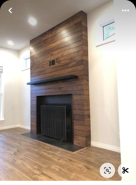 Wood Stain Shiplap Fireplace, Stained Wood Shiplap Fireplace, Brown Shiplap Fireplace, Black Fireplace Wood Paneling, Stained Shiplap Fireplace Wall, Barn Wood Fireplace Wall, Wood Shiplap Fireplace Wall, Stained Wood Fireplace Surround, Cle Tile Fireplace