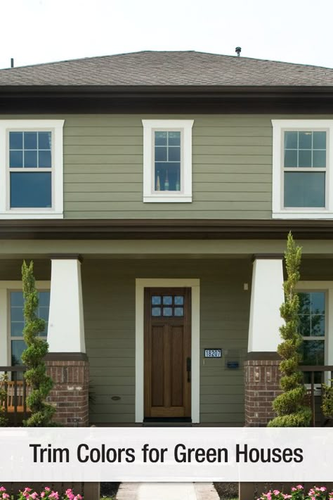 Green siding coupled with crisp white trim can give off a sharp clean look to make your house pop.  #exteriordesign #curbappeal #sidingideas #exteriorideas #homeexterior #exteriorcolor #trimcolor #sidingcolor #homeexterior #exteriorcolor #jameshardie #hardiesiding #hardieplank Green Siding With White Trim, Door Color For Green Siding, Olive House Exterior White Trim, Green Siding Door Color Ideas, Sage Green Siding Color Combinations, Green Siding House With Brick, Exterior House Colors Sage Green, White And Green Exterior House Colors, Green Houses With Cream Trim