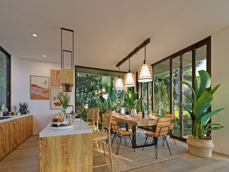 Styled in tropical design, this area offers vibrant aesthetics through the use of rattan chairs, unique pendant lamps, and indoor plants. Its spacious feel is supported by the open-plan layout that blurs the boundaries between the areas, allowing natural light in. Beautiful design by Balitecture for The Kayu in Bali, Indonesia. Tropical Kitchen Design, Chairs Unique, Tropical Kitchen, Tropical House Design, Kitchen And Dining Area, Rattan Chairs, Open Concept Layout, House In Nature, Tropical House