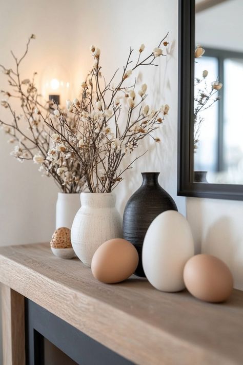 If you want to decorate your house for Easter but are on a strict budget, then try out some of these tips and decor ideas to create statement pieces in your home. Organic Modern Easter Decor, Easter Apartment Decor, After Easter Spring Decor, Easter Decorations Aesthetic, Spring Decor Aesthetic, Easter Garland Ideas, Front Porch Easter Decor, Modern Easter Decorations, Easter House Decor