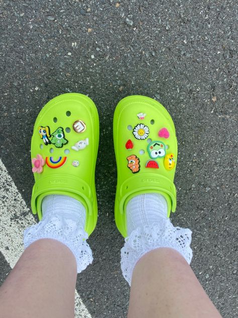 Preppy Croc Jibbitz, Green Crocs With Jibbitz, Green Crocs Outfit, Lime Green Crocs, Sanrio Crocs, Outfits With Crocs, White Frilly Socks, Aesthetic Crocs, Jibbitz Ideas