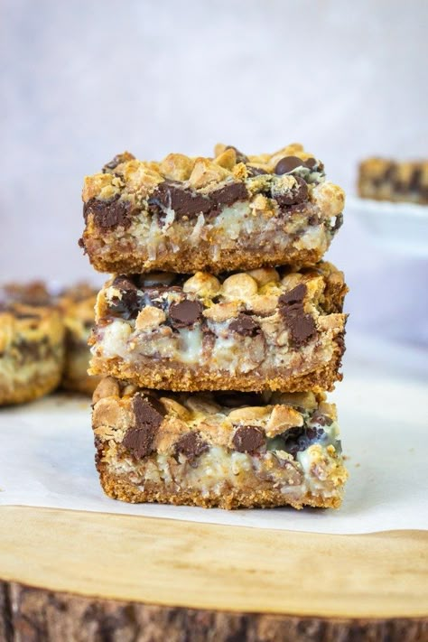 Big Group Desserts, Magic Bars 7 Layer, Healthy Magic Bars, Magic Layer Bars, 13 X 9 Desserts, 7 Layer Bars Eagle Brand, O'henry Bars Recipe, Easy Bars Recipes 9x13, Seven Layer Bars Eagle Brand