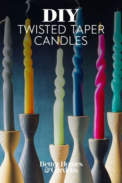 After a quick soak in hot water, it's easy to twist a plain taper candle into a sculptural piece of table decor. Create an inexpensive holiday centerpiece by grouping several candles together on a tray. Get creative when twisting and shaping your candles, the design options are endless. #twistedcandles #diytwistedcandles #diy #diyideas #bhg Christmas Tapered Candles, Taper Candle Making, Making Taper Candles, Decorating With Taper Candles, Shaping Candles, Diy Tapered Candles, Taper Candle Crafts, Candle Stick Crafts, Diy Twisted Candles