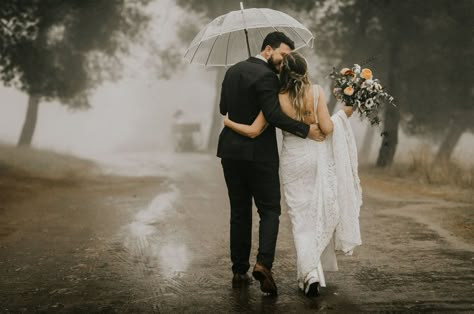 The Rain Was No Match for this Magically Moody Bohemian Wedding | Green Wedding Shoes Rain Wedding Photos, Wedding In The Rain, Rainy Wedding Photos, Rainy Wedding Day, Rain Wedding, Wedding Fotos, Under An Umbrella, Rainy Day Wedding, Umbrella Wedding