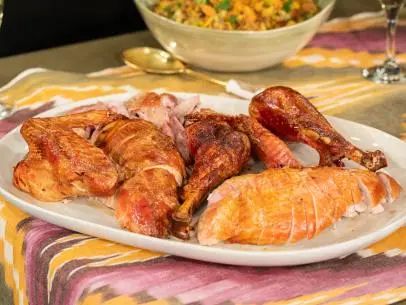 Butter-Basted Turkey and Gravy Recipe | Alex Guarnaschelli | Food Network Butter Blanketed Turkey Food Network, Chicken Stock Gravy, Butter Basted Turkey, Turkey And Gravy, Basting A Turkey, Alex Guarnaschelli, Food Network Chefs, Thanksgiving 2024, Gravy Recipe