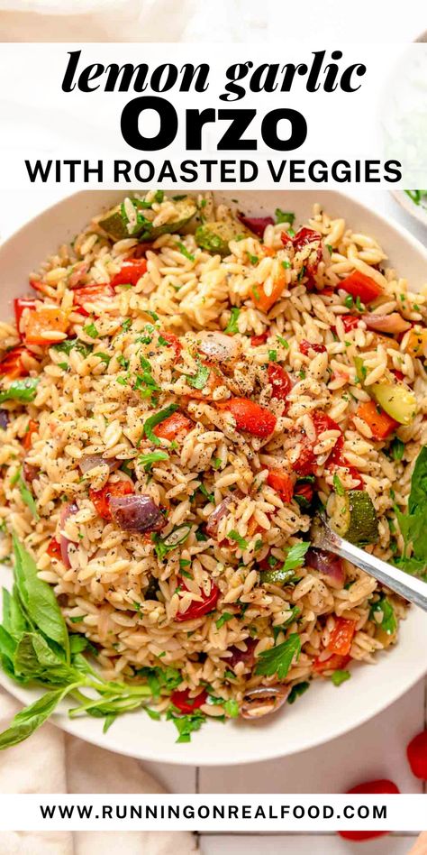 An easy vegan recipe for orzo with savory herb roasted vegetables in a zesty garlic lemon dressing. Enjoy this pasta hot or as a cold pasta salad – both ways are delicious! Healthy Orzo Salad Recipes, Orzo Vegetable Recipes, Orzo With Vegetables, Whole Wheat Orzo Recipes, Veggie Orzo Recipes, Vegan Orzo Salad, Orzo And Broccoli Recipe, Orzo Vegan, Roasted Vegetable Orzo