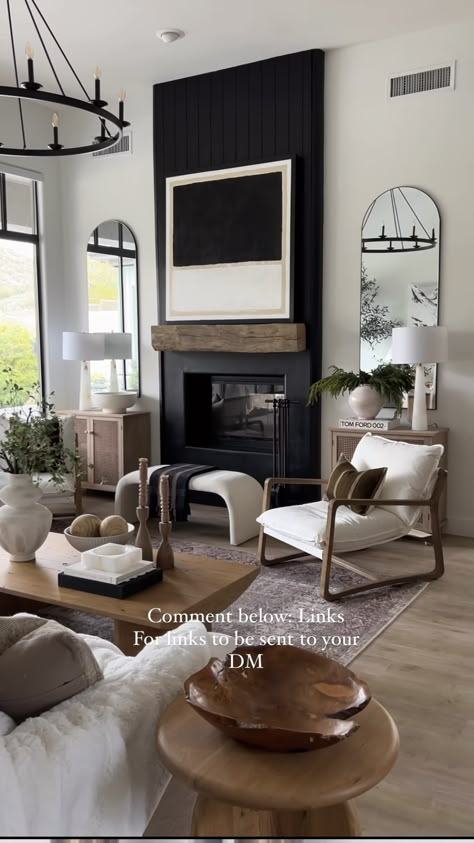 Neutral Living Room With Black Fireplace, Dark And Neutral Living Room, Minimalist Chimney Living Rooms, Fireplace With Mirrors On Each Side, Black Tall Fireplace Wall, Two Story Black Fireplace, Large Lounge Room Ideas, Formsl Living Froom Fireplace, Masculine Tv Room Bpack Chair