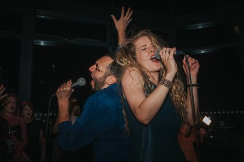 Man and women singing karaoke at a wedding. Picture by Matt Badenoch Karaoke Reference Pose, Karaoke At Wedding, Couple Karaoke, Karaoke Photography, Wedding Karaoke, Couple Singing, Karaoke Wedding, October Elopement, Karaoke Aesthetic