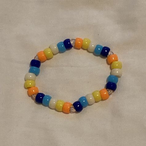 Aroace pride flag Kandi singlet Aroace Kandi, Aroace Outfit, Aroace Bracelet, Pride Flag Bracelet, Kandi Inspo, 3 Musketeers, Trans Flag, Kandi Ideas, Oc Outfits