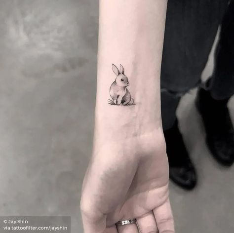 Hase Tattoos, White Rabbit Tattoo, Unique Tattoos Black Women, Bunny Tattoo, Rabbit Tattoo, Bunny Tattoos, Rabbit Tattoos, Wrist Tattoos For Women, Cute Tattoos For Women