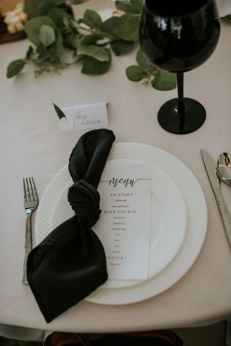 Black Wedding Napkins Place Settings, Black Satin Napkin Wedding, Black Table Cloth With White Lace Overlay, Wedding White Tablecloth Black Napkins, White Napkin Black Menu Wedding, Black Napkin Wedding Place Settings, Minimalist Rehearsal Dinner Decor, Wedding Table Black Napkins, White Table Black Runner