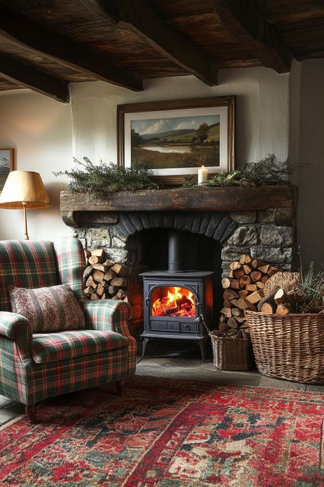 Cozy stone fireplace with woodburning stove and plaid armchair. Get ready for a whimsical journey through dark cottagecore interiors where quaint charm meets mysterious, cozy nooks that might just inspire your next favorite hideaway. Wood Stove Sitting Area, Cozy Scottish Cottage, Victorian Style Cottage, Historic Home Fireplace, English Cottage Stone Fireplace, Scottish Highland Interiors, Old English Cottage Interiors Fireplaces, Vermont Living Room, Old Cottage Fireplace