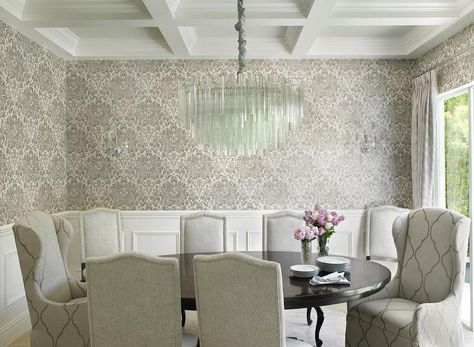 White and gray dining room features top half of walls clad in gray and black damask wallpaper and bottom half of walls clad in wainscoting. Crown Molding Ideas, Movie Dress Up Ideas, Versace Wallpaper, Installing Wainscoting, Mahogany Flooring, Dining Room Layout, Emily Henderson Design, Wainscoting Ideas, Kate Marker Interiors