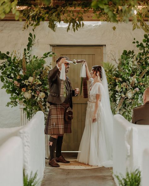 HANDFASTING What’s handfasting? It’s probably the most popular Scottish wedding tradition alongside the quaich. It originated in ancient Celtic times and it was a way to get people married. Simply by tying their hands with a piece of fabric from the bride’s skirt and groom’s tartan. Nowadays this tradition is still very much alive, however the form varies and it purely depends on the couple who is getting married. Hands can be tied with tartans, ropes, lace ribbons, anything what couple ... Married Hands, Scottish Wedding Traditions, Very Much Alive, Highland Wedding, Scottish Wedding, Wedding Ties, Lace Ribbon, Tie Knots, Celtic Knot