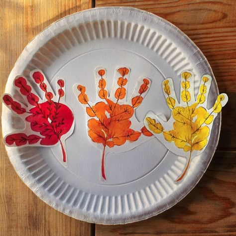 20 Fall Handprint Crafts to Celebrate the Autumn Season Brown Handprint Craft, Fall Harvest Crafts For Infants, Harvest Time Crafts For Toddlers, Orange Handprint Craft, Autumn Handprint Crafts, Fall Language Activities For Toddlers, Fall Hand Prints For Toddlers, Fall Infant Crafts Daycare Room, Fall Harvest Infant Art