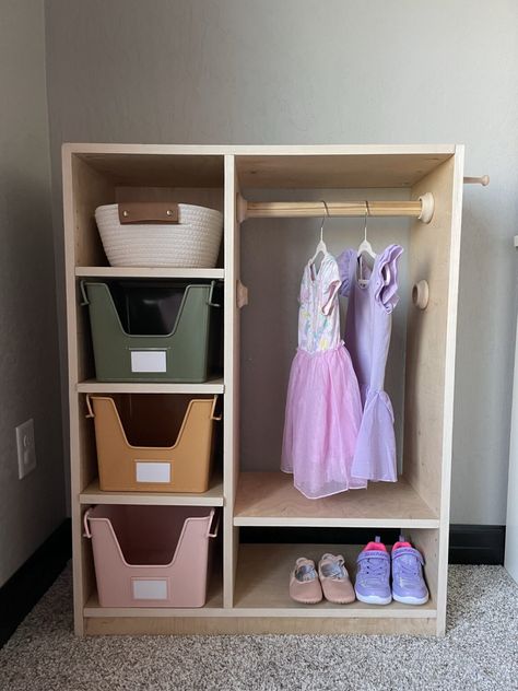 DIY Montessori Toddler Wardrobe Diy Montessori Dressing Area, Montessori Closet Diy, Toddler Wardrobe Montessori, Diy Toddler Furniture, Montessori Clothes Storage, Toddler Dressing Station, Montessori Furniture Diy, Diy Kids Wardrobe, Montessori Dressing Area