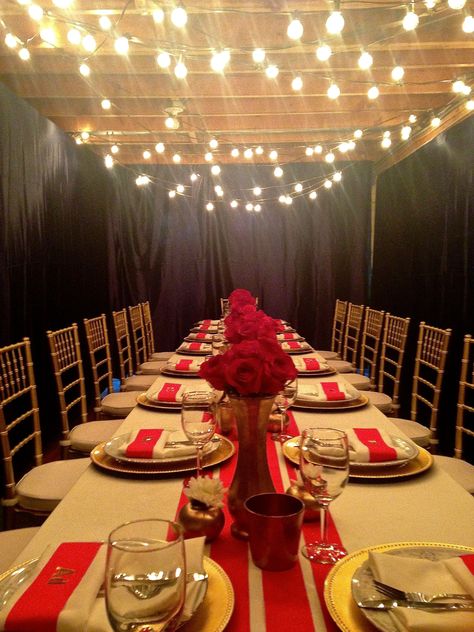 Bring those patio lights inside and add some twinkle to your party! This dinner was actually in an unfinished basement. We draped walls in navy fabric to keep the party dark and romantic and added string globe lights to the ceiling to take away from the raw wooden beams. Basement Dinner Party, Basement Birthday Party Ideas, Basement Birthday Party, Draped Walls, Basement Ceiling Insulation, Basement Party, Unfinished Basement Walls, Basement Ceiling Ideas Cheap, Small Basement Design