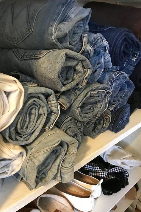 10 Closet Organizing Ideas I Learned From a Stylist | Who What Wear UK Organizing Jeans, Jeans In Closet, Suburban Mansion, Closet Organizing Ideas, Jean Organization, Packing For A Trip, Rolled Jeans, Closet Hacks Organizing, Quality Basics