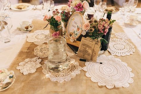 Wedding doilies table decor, from 'A 1920s and 1930s Antique and Old Fashioned Vintage Inspired Barn Wedding'.  Photography http://www.brighton-photo.com/ Dollie Centerpieces, Antique Wedding Inspiration, 1930s Centerpieces, 19th Century Wedding Theme, Doily Centerpiece Wedding, Antique Garden Wedding, 1930s Wedding Theme, Vintage Wedding Decorations 1920s, Vintage Centerpiece Wedding