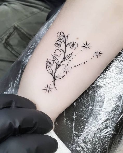 Dainty taurus flower tattoo Taurus Star Constellation Tattoo Flower, Flower Taurus Tattoo, Taurus Floral Tattoo, Taurus Star Tattoo, Taurus Tattoo Ideas For Women, Unique Taurus Tattoo Ideas, Taurus Flower Tattoo, Miscarried Baby Tattoo, Lily Tattoos For Women