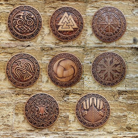 Viking wall decor Introducing a wooden panel crafted from oak featuring a circular Scandinavian ornament. ✧ Material: oak ✧ Diameter: 9,84 inches (25 cm) This exquisite piece of woodwork offers a central symbol of your choice, each carrying its own unique significance and connection to Norse mythology. ✦ Sleipnir: The legendary eight-legged horse of Odin, Sleipnir symbolizes travel between the realms of gods and matter, traversing land and air with its eight legs representing the directio... Viking Ornament, Norwegian Vikings, Wooden Panel, Norse Mythology, Vikings, Coasters, Matter, Wall Decor, Wall