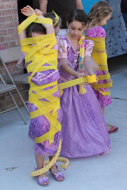 Tangled party games | we played a Tangled game where each girl got a partner and they had to tangle their partner in yellow crepe paper in the allotted time! The judges decided which girl was the most Tangled and then they switched and let the other partner get Tangled! Princess Birthday Party Games, Princess Party Games, Tangled Birthday Party, Rapunzel Birthday Party, Games Indoor, Rapunzel Birthday, Tangled Birthday, Disney Princess Birthday Party, Super Princess