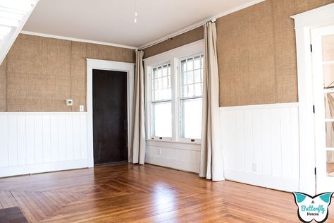 When I was planning out my living room, I knew I needed to add texture somewhere and I ultimately decided the walls were the perfect place! While the bottom half had wainscoting, I was able to add burlap to the top half, adding a unique feature to the room!   Before I started, my room looked like this.   I started by making the "glue" that would hold the burlap to the walls, which is basically just 1 part cornstarch to 8 parts water. You'll note there are a ton of lumps in my glue. It… Drop Cloth Curtains Outdoor, Bathroom Ceiling Ideas, Burlap Wallpaper, Large Wooden Planters, Burlap Wall Art, Basement Steps, Diy Curtain Rods, Homemade Curtains, Curtains Outdoor