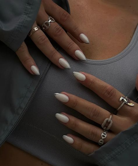 Your metallic manicure moment has arrived ✨. Check out our collection of mod chrome nail designs--featuring these milky white chrome nails with metallic silver French tips--for tons of chic chrome nail inspo! Wife Nails, White Chrome Nails, Kutek Disney, Pink Chrome Nails, Chrome Nail Art, Milky Nails, Chrome Nails Designs, Nagel Tips, October Nails