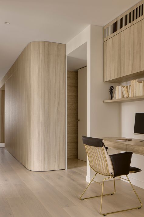 The natural aesthetic study features curved walls, light timber, in built cabinetry and chic leather and brass desk chair. Contemporary Apartment Building, Unique Office Furniture, Study Home Office, Comfortable Desk, Flooring Wood, Brass Desk, Unique Office, Study Furniture, Flooring Design