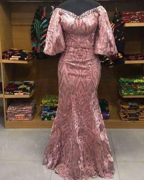 Unique Lace Styles, Unique Asoebi Lace Styles, Simple Owambe Lace Styles, Simple Asoebi Styles Lace, Lace Dress Styles For Weddings, Simple Lace Styles, Simple Lace Gown, Model Dress Brokat Modern, Reception Dress Lace