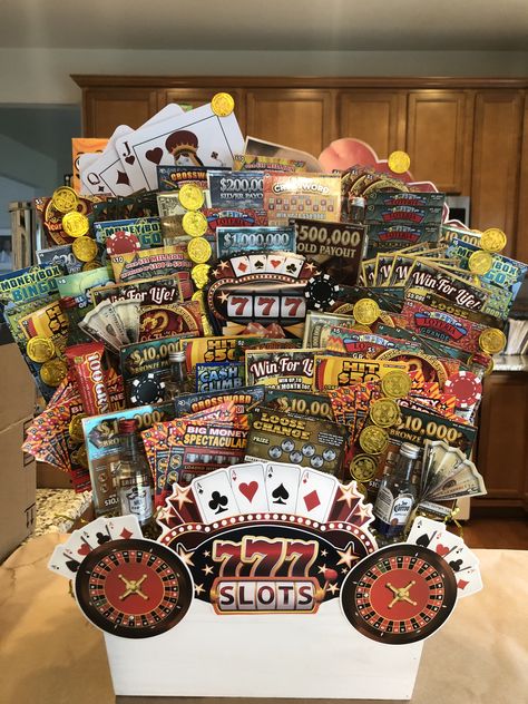 Casino Basket Ideas, Man Crates Diy Gift Ideas, Basket Raffle Themes, 50/50 Raffle Ideas, Themed Baskets For Raffles, Casino Gift Basket, Raffle Basket Ideas Fundraising, Dollar Tree Gift Basket Ideas, Euchre Tournament