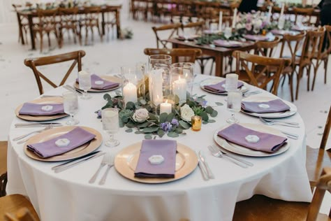 Candle centerpiece with eucalyptus and lavender flowers for the White Sparrow wedding. Megan Kay Photography. Purple Place Setting Wedding, Lilac And Sage Wedding Centerpieces, Lilac Wedding Centerpieces, Lavender Flower Centerpieces, Centerpiece With Eucalyptus, Centerpiece Eucalyptus, Lavender Wedding Centerpieces, Wedding Table Decorations Purple, Lavender Wedding Decorations