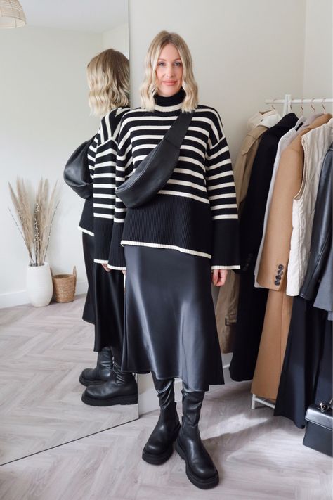 Black Striped Jumper Outfit, Navy Stripe Jumper Outfit, Toteme Striped Sweater, Striped Sweater Skirt Outfit, Black And White Striped Jumper, Satin Skirt And Jumper Outfit, Toteme Striped Sweater Outfit, Stripe Knit Outfit, Striped Knit Sweater Outfit