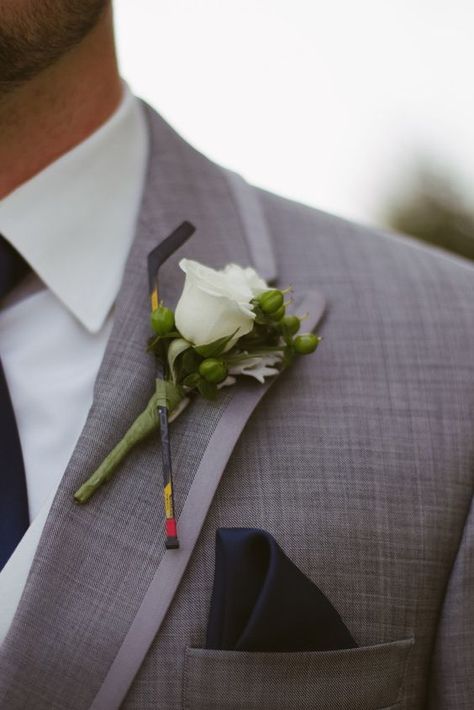 hockey stick boutonniere #hockeyweddingtheme #hockeyweddingideas #hockeyweddingphotos #hockeyweddingevents #hockeyweddingdecorations #hockeyweddingcenterpieces #hockeyweddingcake #hockeywedding favors #icehockeywedding #hockeyweddingdress #hockeyweddinginvitations #hockeyweddingring #hockeyweddingreception #fieldhockeywedding #hockeyweddingshower Hockey Boutonniere, Hockey Wedding Photos, Hockey Wedding Ideas, Hockey Wedding Theme, Hockey Wedding Cake, Hockey Engagement Photos, Hockey Senior Night, Hockey Wedding, Boutonniere White