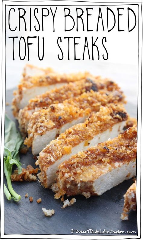 Crispy Breaded Tofu Steaks! Moist and tender tofu, zingy tomato marinade, with a crispy breadcrumb coating. A quick and easy recipe that is perfect for serving with potatoes and veg. Gluten free option. #itdoesnttastelikechicken Tomato Marinade, Tofu Steaks, Breaded Tofu, Tofu Steak, Vegan Tofu, Like Chicken, Idee Pasto Sano, Tofu Recipes, Vegetarian Meals