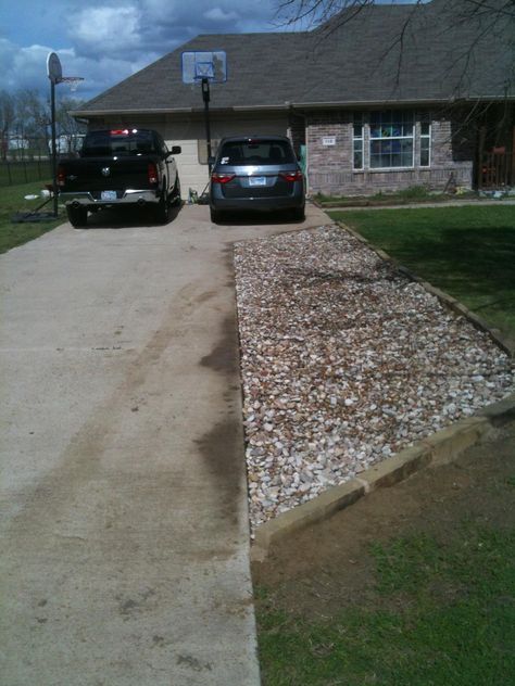 I needed to extend my driveway, so instead of using concrete, I used river rock.  I tilled a 26X7 area, mortared Oklahoma ledges as the stone border, leveled the area, laid down a weed barrier and used 1.5 yards of Rainbow River Rock. Extended Driveway Ideas, Diy Gravel Driveway, Driveway Addition, Front Yard Parking, Pathway Diy, Gravel Driveway Ideas, Pathway Tiles, Extended Driveway, Driveway Extension