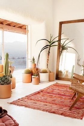 Whether you're settled in an airstream or you dream of living closer to the mountains, desert decor can help bring the outdoors in. Here, we're looking at some ways to bring desert decor into your home. #hunkerhome #desertinspired #desertdecor #desertstyleideas #desertdecorideas Desert Living Room, Zimmer Diy, Bohemian Chic Decor, Lots Of Plants, Desert Chic, Desert Decor, Modern Desert, Desert House, Desert Living