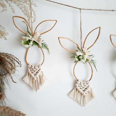 Hoppy Easter! Easter is a time to celebrate new beginnings and the hope of spring. It's also a time to decorate your home and get into the festive spirit. These adorable macrame bunny ear ornaments are the perfect way to add a touch of Easter cheer to your home. They can be customized with your favorite colors. Plus, they're a great way to add a personal touch to your Easter decorations. What are your favorite Easter decorations that you display every year? #EasterDecor #MacrameEaster #eas... Spring Macrame Ideas, Easter Macrame Ideas, Boho Easter Decor, Easter Macrame, Macrame Easter, Easter 2025, Boho Easter, Macrame Style, Macrame Decor