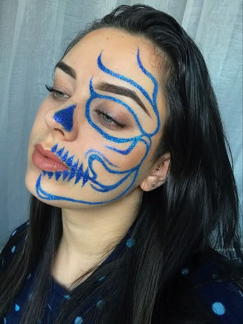 Face Paints For Halloween, Blue Eye Makeup Halloween, Face Paint Skeleton Easy, Blue Makeup Looks Halloween, Skull Rhinestone Makeup, Blue Halloween Makeup Ideas, Halloween Makeup Face Paint, Blue Makeup Halloween, Blue Skeleton Makeup