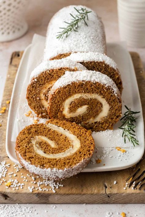 This Gingerbread Swiss Roll cake is both light, fluffy and packed full of ginger flavour. This simple, festive cake, filled with delicious cream cheese filling is perfect for the holiday season. By Emma Duckworth Bakes Pumpkin Rolls Recipe, Swiss Roll Cake, Cream Cheese Eggs, Christmas Spices, Pumpkin Roll, Delicious Cream, Swiss Roll, Roll Cake, Cake Roll