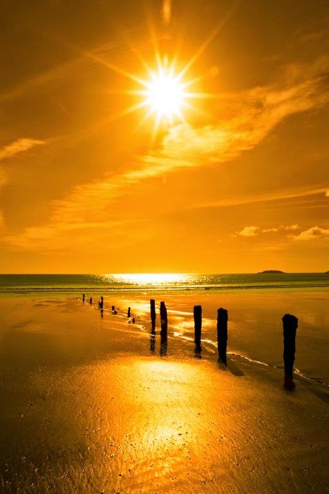 Golden sunshine over the beach breakers and blue Atlantic sea in Youghal County, Cork Ireland on a summers day. Amazing Sunsets, Wallpaper Vintage, Beautiful Sunrise, Beautiful Sky, Beautiful Sunset, The Sand, Sunrise Sunset, Beach Life, Beautiful World