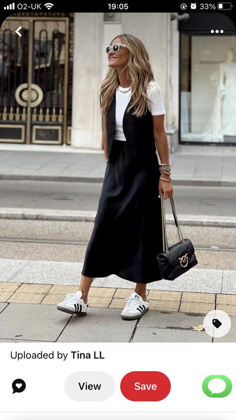 Black Skirt And Sambas Outfit, Silky Black Skirt Outfit, Black Midi Skirt Outfit Summer Casual, Tomboy Skirt Outfit, Black Gilet Outfit Women, Weekend Trip Outfits Summer, Black Midi Skirt Outfit Summer, Black Satin Skirt Outfit Summer, Gilet Outfit Women